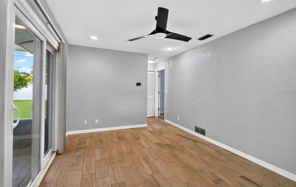 1309 Suwanee Road Daytona Beach, FL 32114 - Photo 10 of 33 a view of an empty room and window