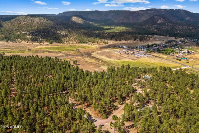 a view of a lake with mountains in the background