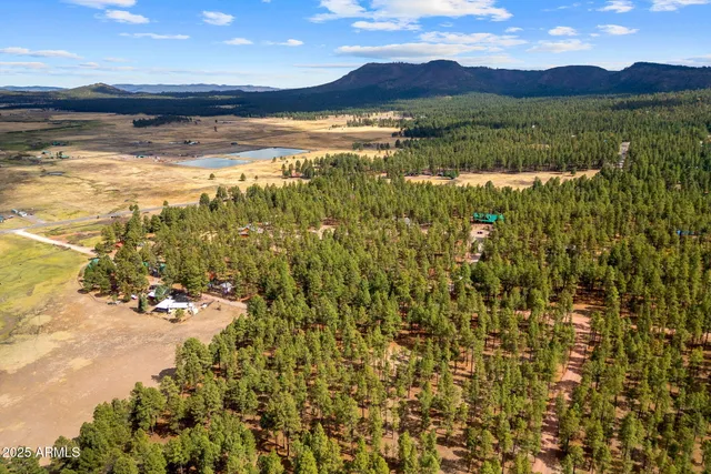 a view of an ocean and a mountain