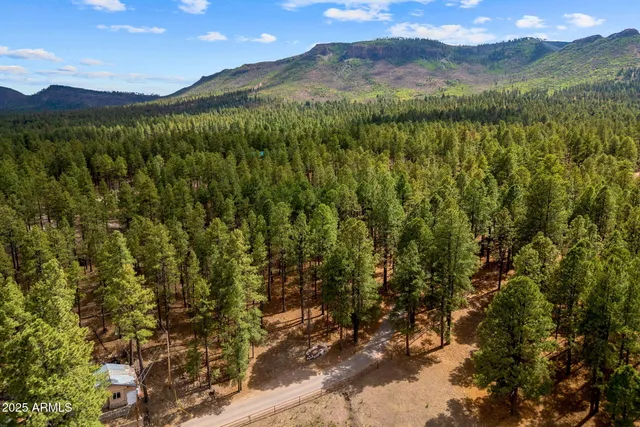 a view of mountain view with mountains in the background