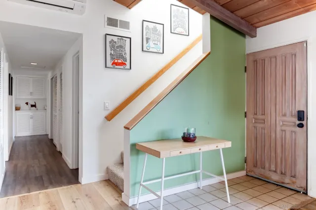 a bedroom with bed and window