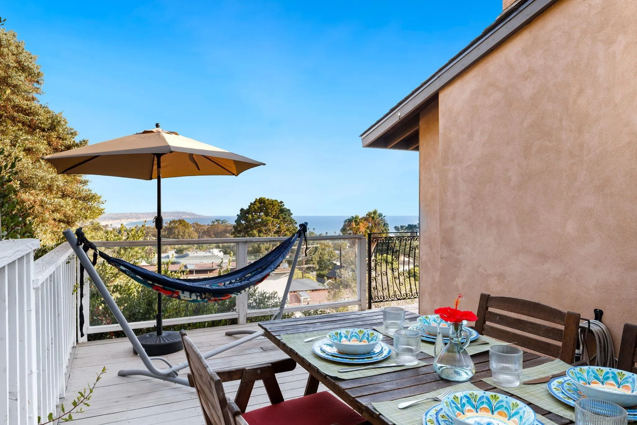 5643 Linda Rosa Avenue La Jolla, CA 92037 - Photo 27 of 56 a table and chairs in the patio