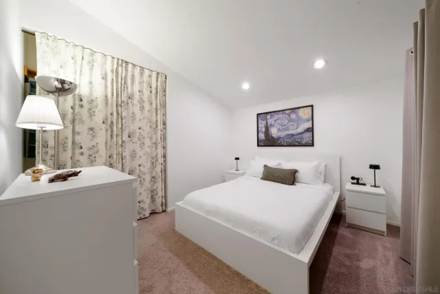 an aerial view of a city with lots of residential buildings