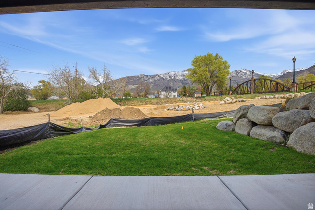 250 South Main Street, Unit 24 Alpine, UT 84004 - Photo 38 of 50 View of green lawn with a mountain view