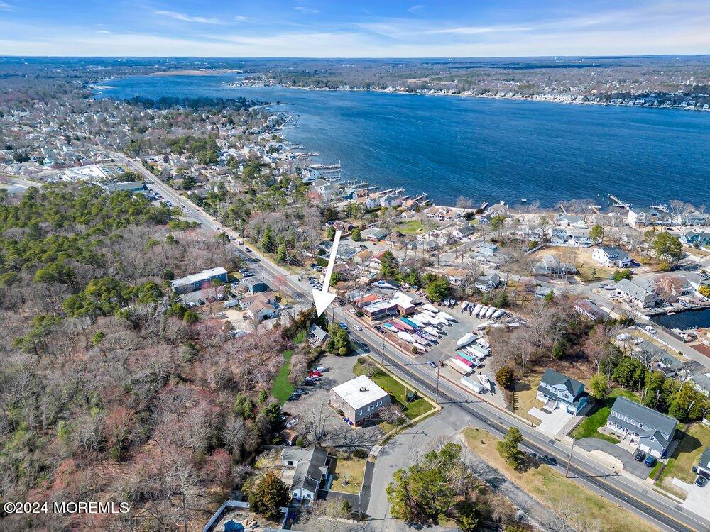 327 Mantoloking Road Brick, NJ 08723 - Photo 13 of 16 view of a city with an ocean