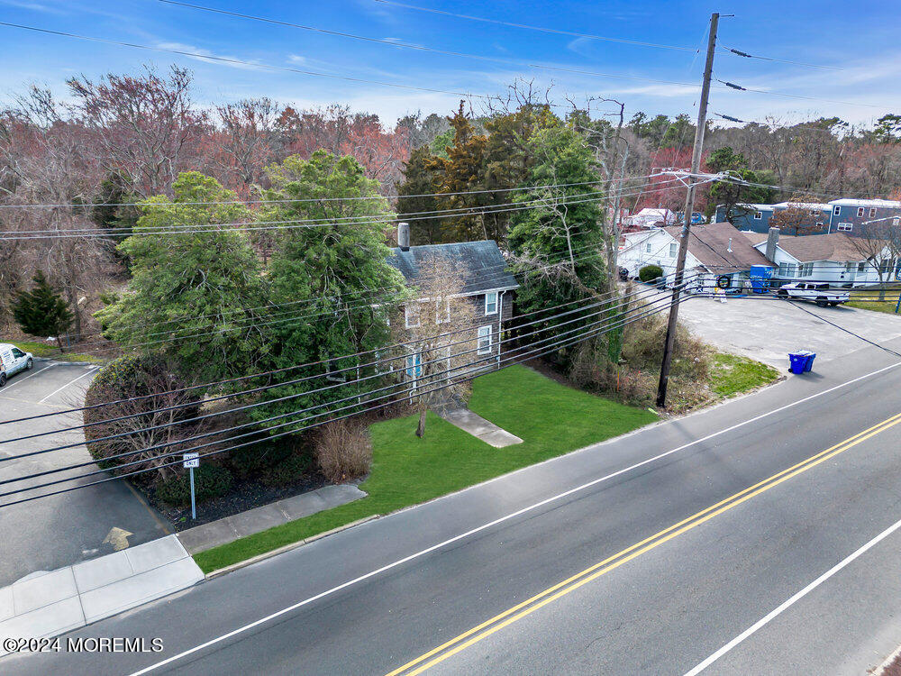 327 Mantoloking Road Brick, NJ 08723 - Photo 2 of 16 a view of a balcony with an outdoor seating