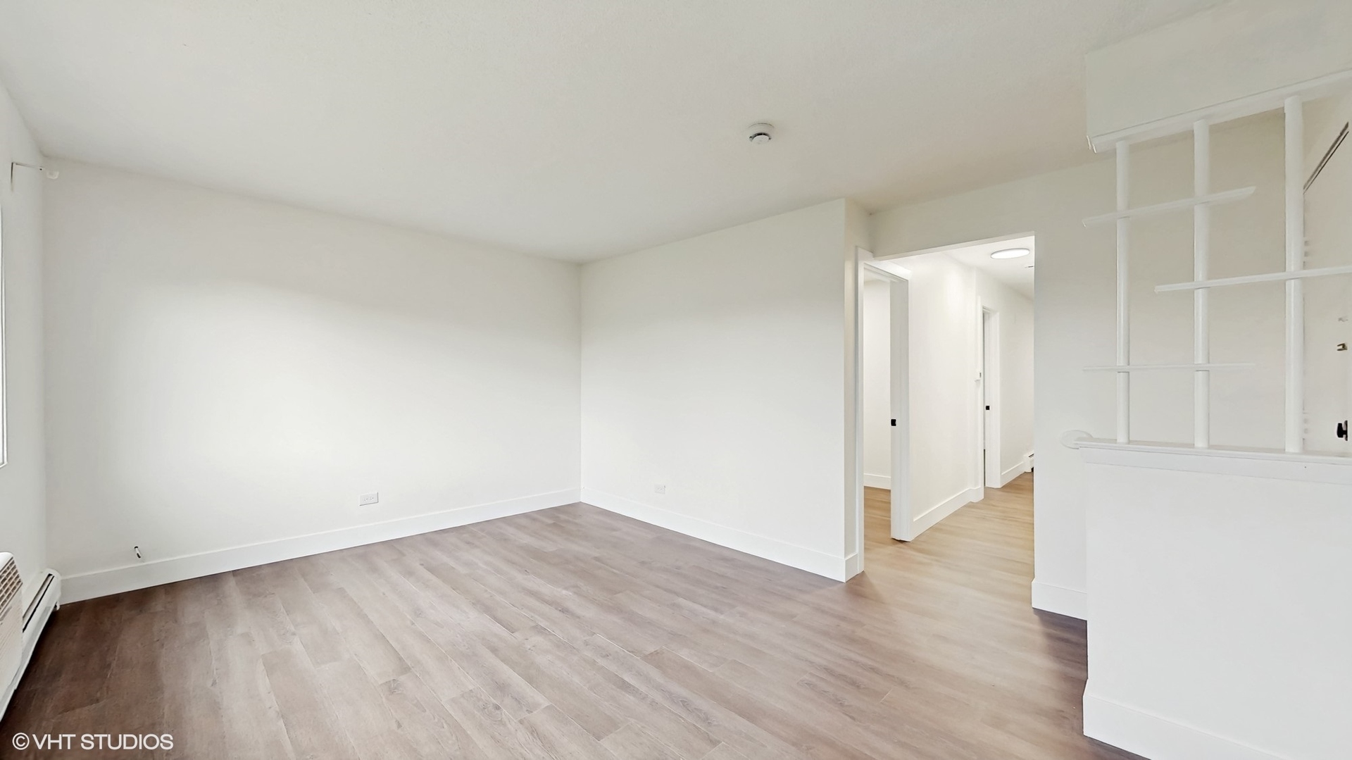 10382 Michael Todd Terrace, Unit GE Glenview, IL 60025 - Photo 6 of 15 a view of a room with wooden floor