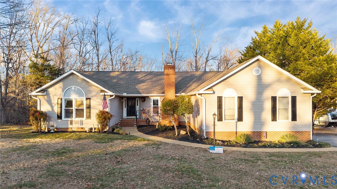 518 Rebel Ridge Road Colonial Heights, VA 23834 - Photo 2 of 44 a view of a house with a yard and wooden fence