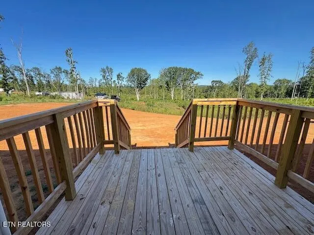 a balcony with view of swimming pool