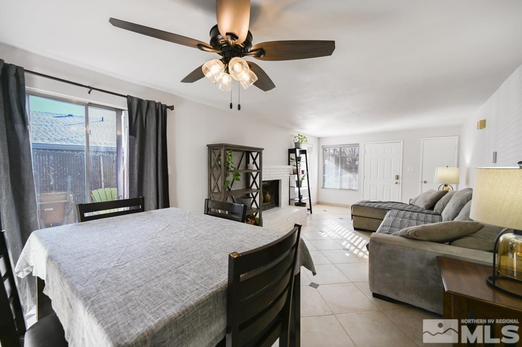 340 West Hampton Drive Carson City, NV 89706 - Photo 12 of 24 a living room with furniture and a large window