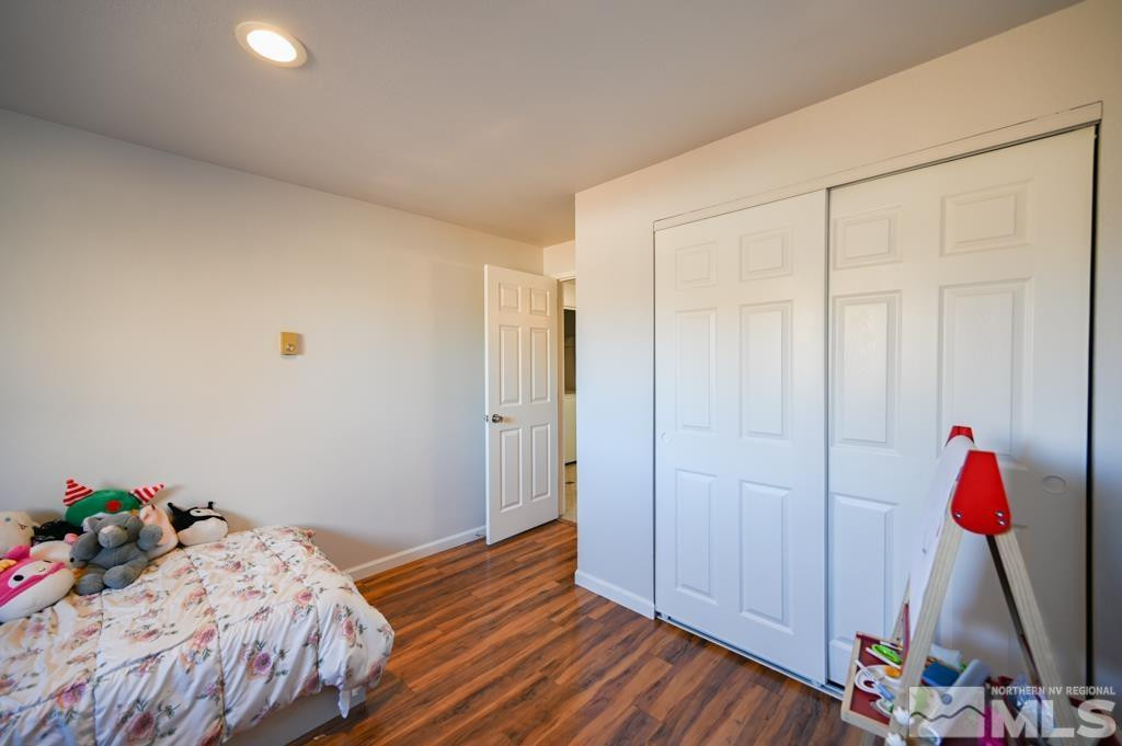 340 West Hampton Drive Carson City, NV 89706 - Photo 21 of 24 a bedroom with a bed and a closet
