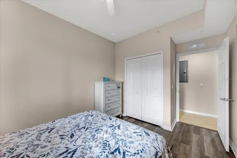 a bedroom with a bed and walk in closet