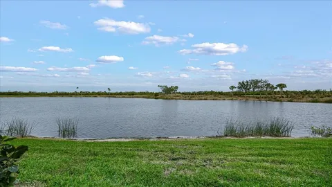 a view of a lake from a yard