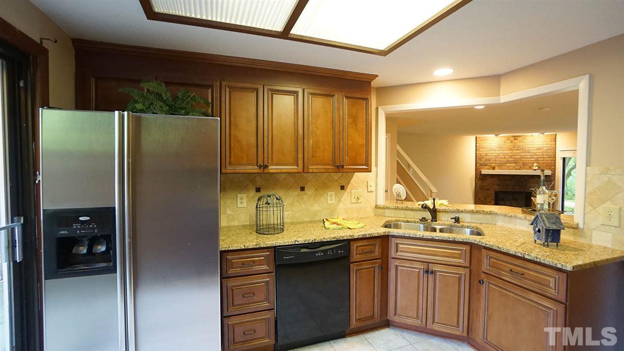 4301 Sun Belt Place Raleigh, NC 27613 - Photo 12 of 23 Kitchen has Ceramic Tile Floor