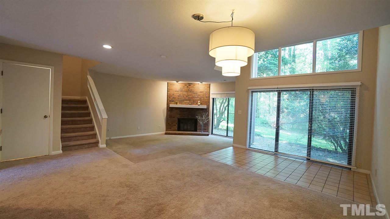 4301 Sun Belt Place Raleigh, NC 27613 - Photo 5 of 23 Living Room Open to Dining Room ... Open to Sun Room ... Open to Kitchen ... How Wonderful!!! Bright and Sunny + Lots of Space to Enjoy Life!