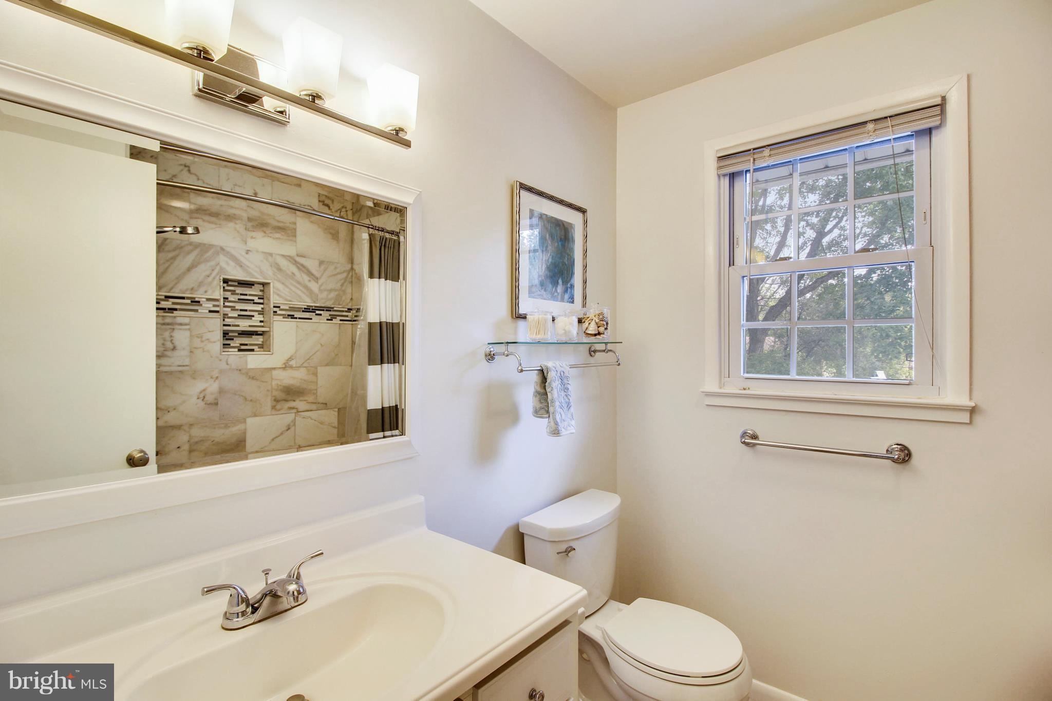 11501 Alma Street Silver Spring, MD 20902 - Photo 22 of 29 Beautiful new full bath with tub