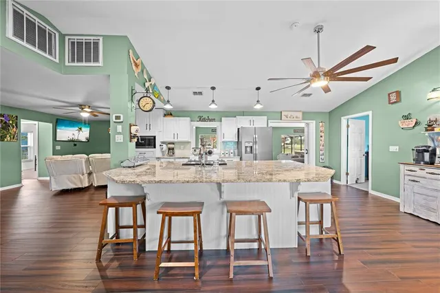 a room with a bed and furniture