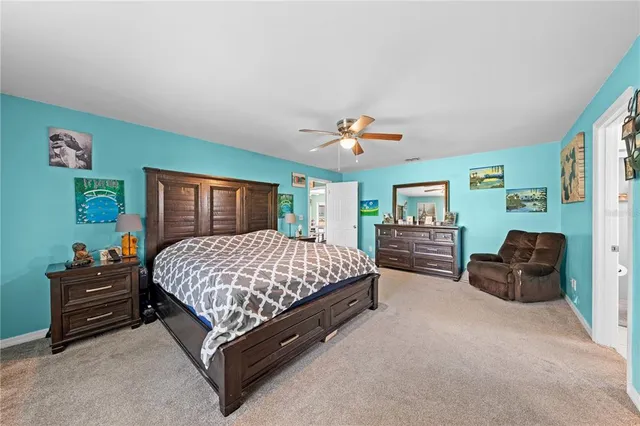 a large kitchen with kitchen island granite countertop a lot of counter space