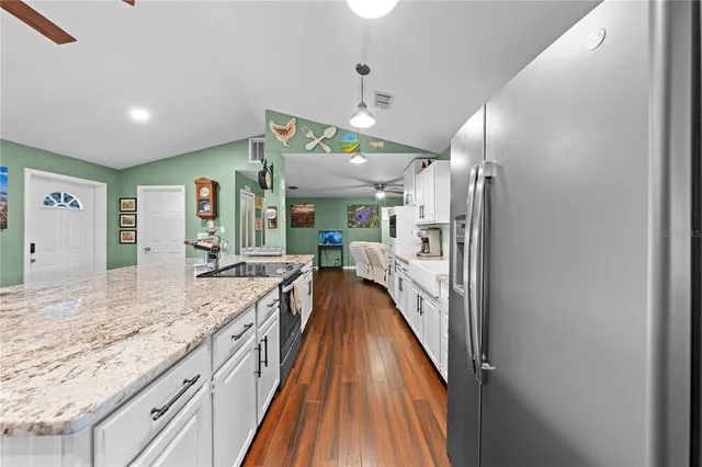 a bedroom with bed and window