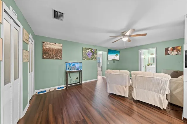 a view of a swimming pool with a patio