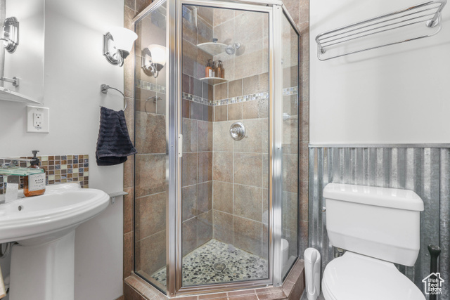 2029 West Tollgate Road Coalville, UT 84017 - Photo 22 of 43 Bathroom with a stall shower and a wainscoted wall