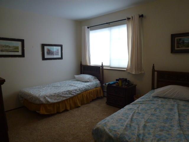 180 Evergreen Road, Unit 201 Dillon, CO 80435 - Photo 3 of 20 a bedroom with a bed and a window