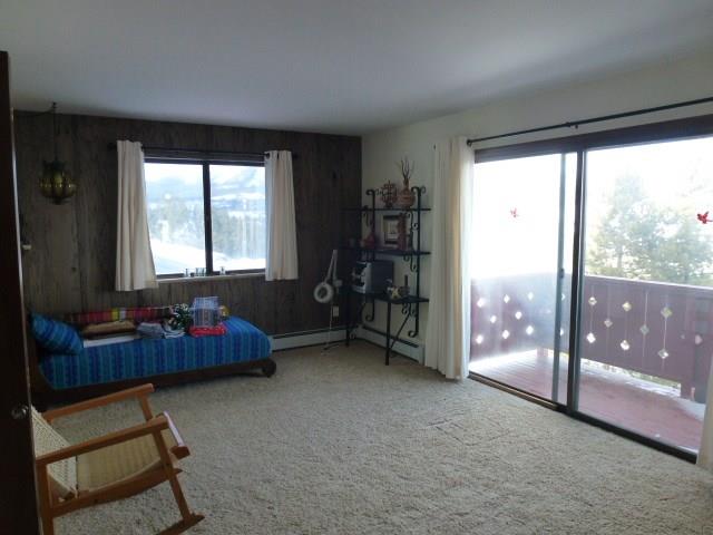 180 Evergreen Road, Unit 201 Dillon, CO 80435 - Photo 8 of 20 a living room with furniture and large window
