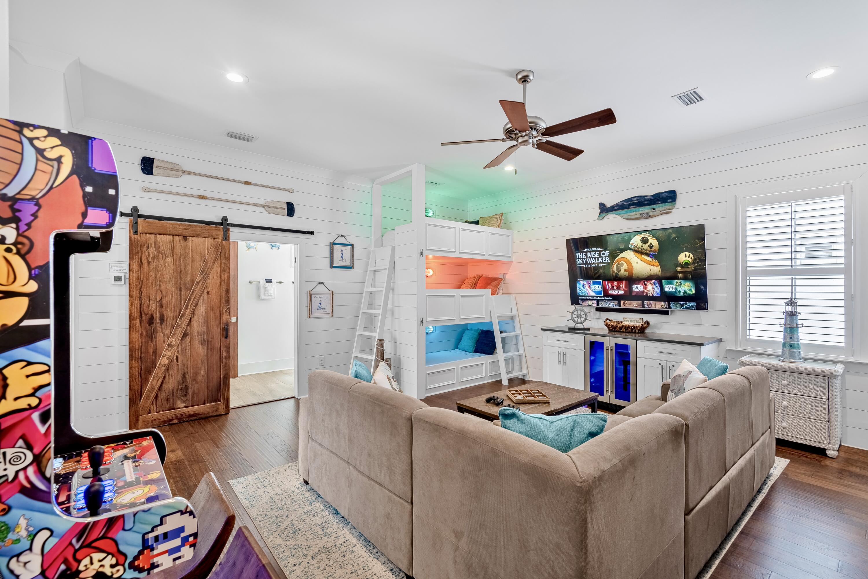 63 Wadleigh Way Miramar Beach, FL 32550 - Photo 12 of 42 a living room with furniture and a flat screen tv