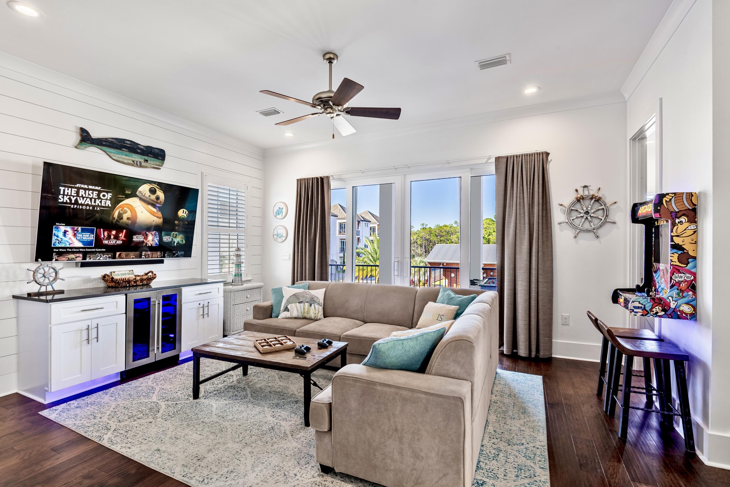 63 Wadleigh Way Miramar Beach, FL 32550 - Photo 14 of 42 a living room with furniture and a flat screen tv
