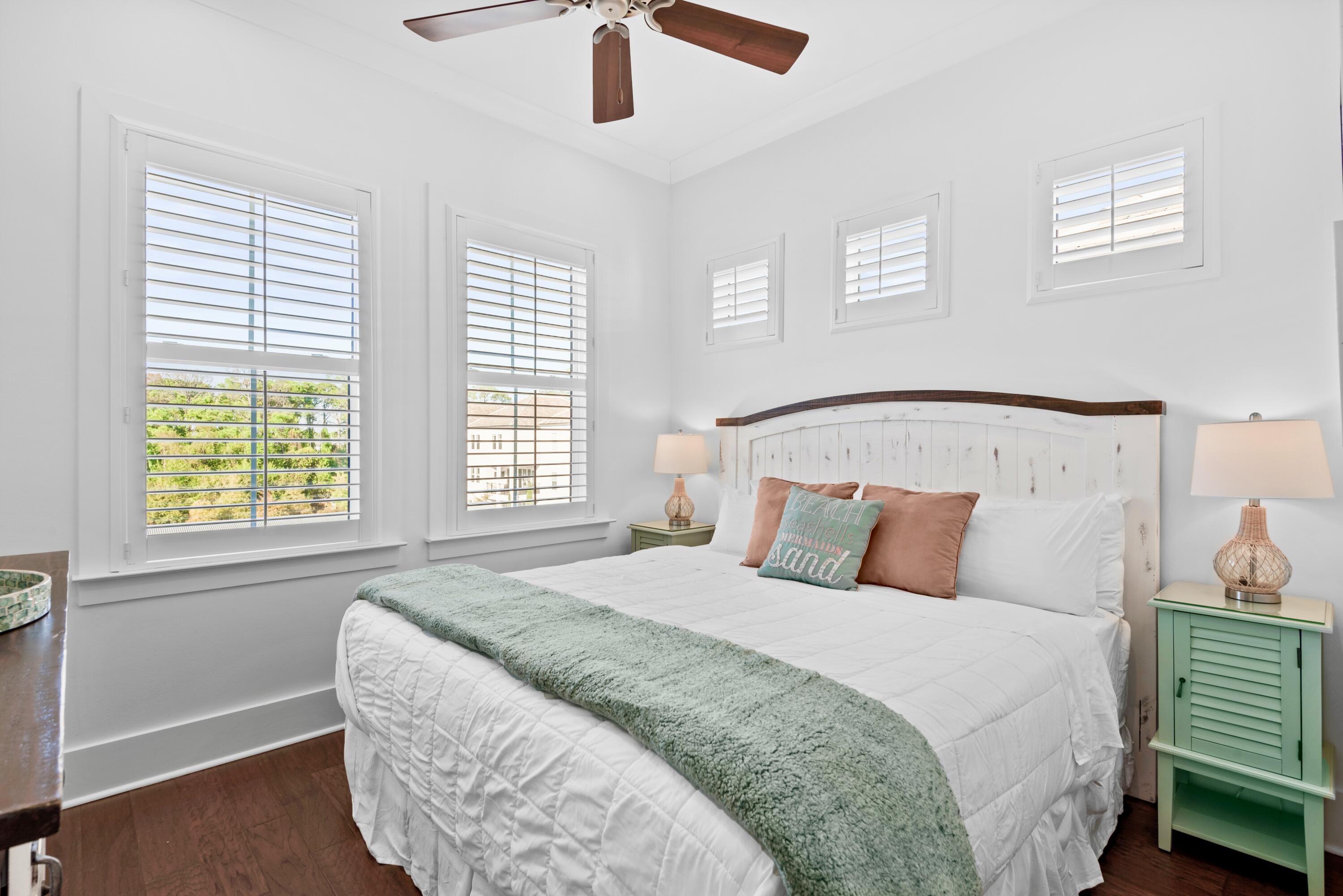 63 Wadleigh Way Miramar Beach, FL 32550 - Photo 21 of 42 a bedroom with a bed and window