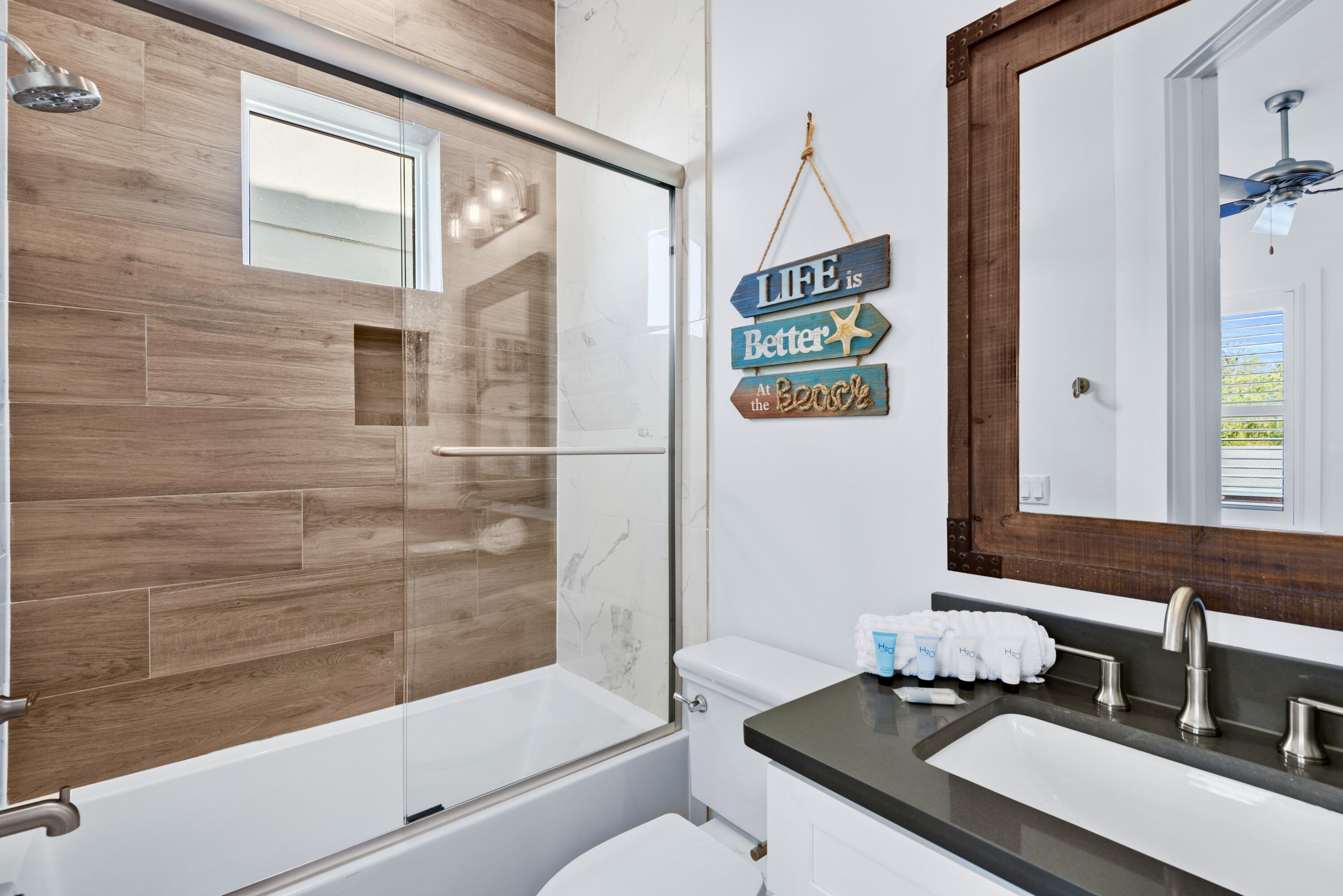 63 Wadleigh Way Miramar Beach, FL 32550 - Photo 22 of 42 a bathroom with a sink and a mirror