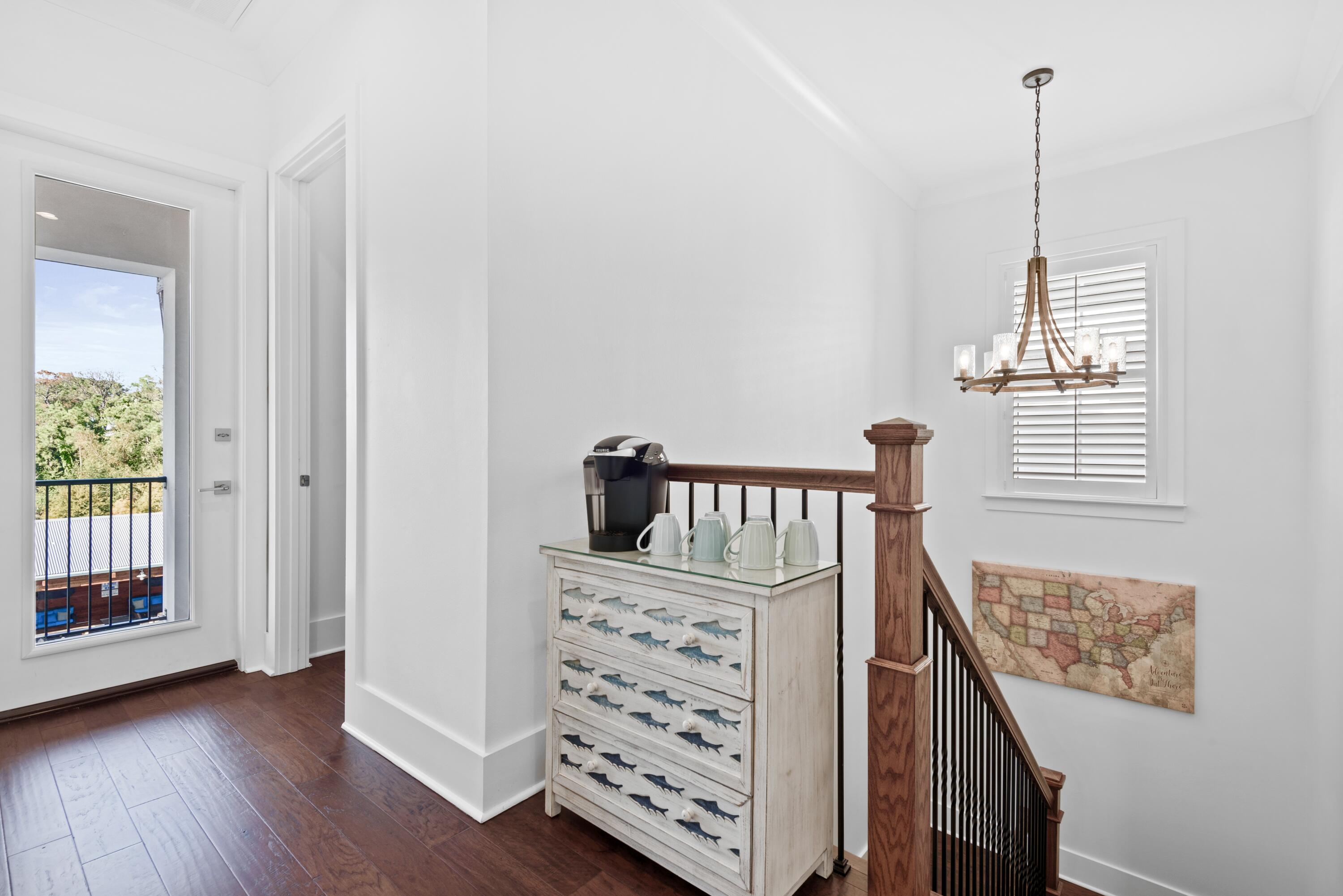63 Wadleigh Way Miramar Beach, FL 32550 - Photo 23 of 42 a view of a bedroom with furniture and windows