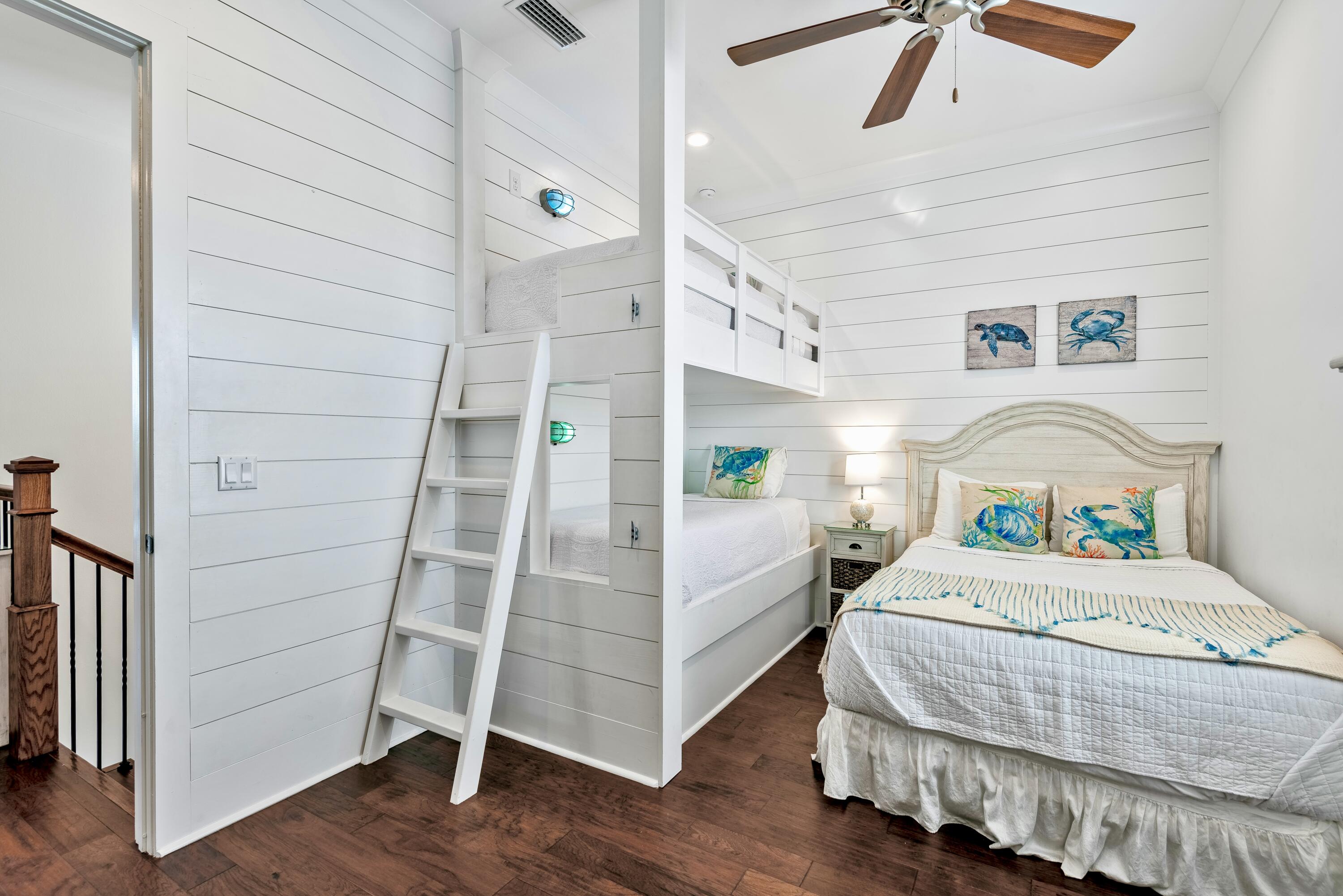 63 Wadleigh Way Miramar Beach, FL 32550 - Photo 29 of 42 a bedroom with a bed and a ceiling fan