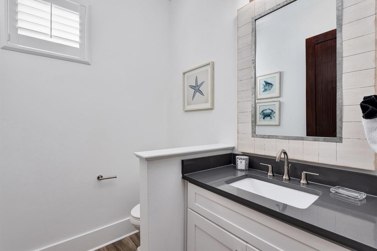 63 Wadleigh Way Miramar Beach, FL 32550 - Photo 10 of 42 a bathroom with a sink and a mirror
