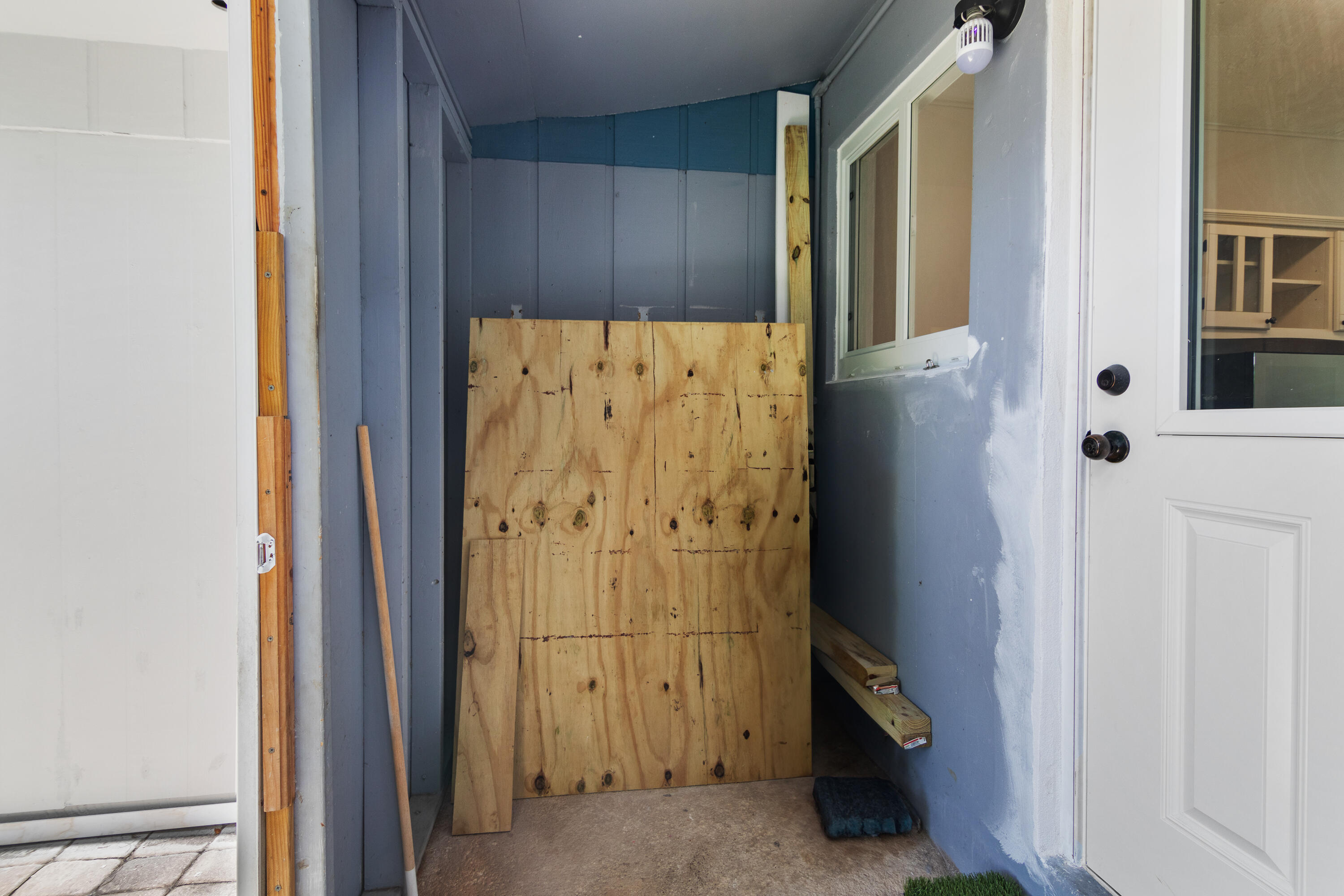 10873 7th Ave Gulf Marathon, FL 33050 - Photo 21 of 25 a view of an entryway with wooden door