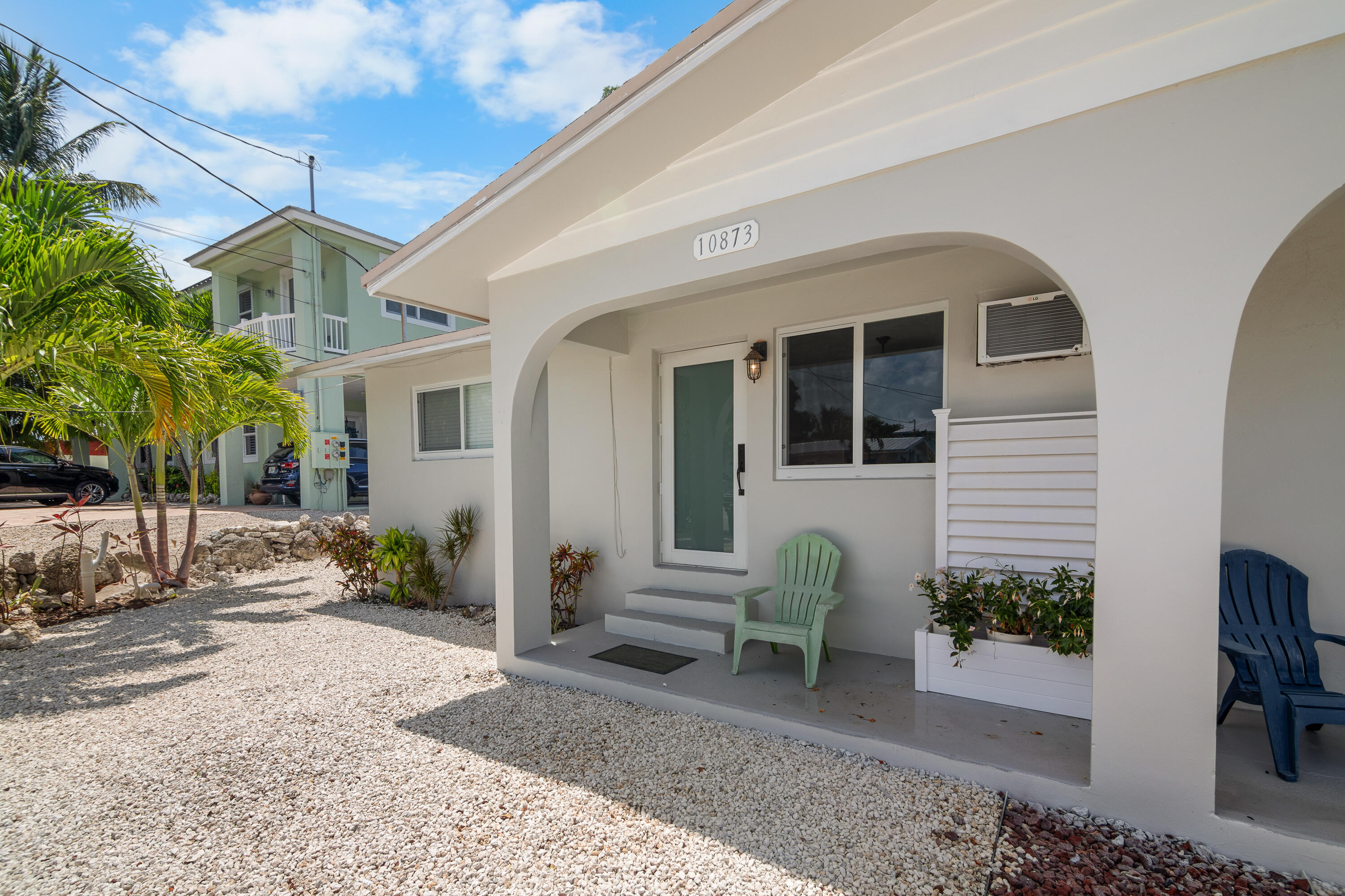 10873 7th Ave Gulf Marathon, FL 33050 - Photo 23 of 25 a view of a house with backyard and sitting area