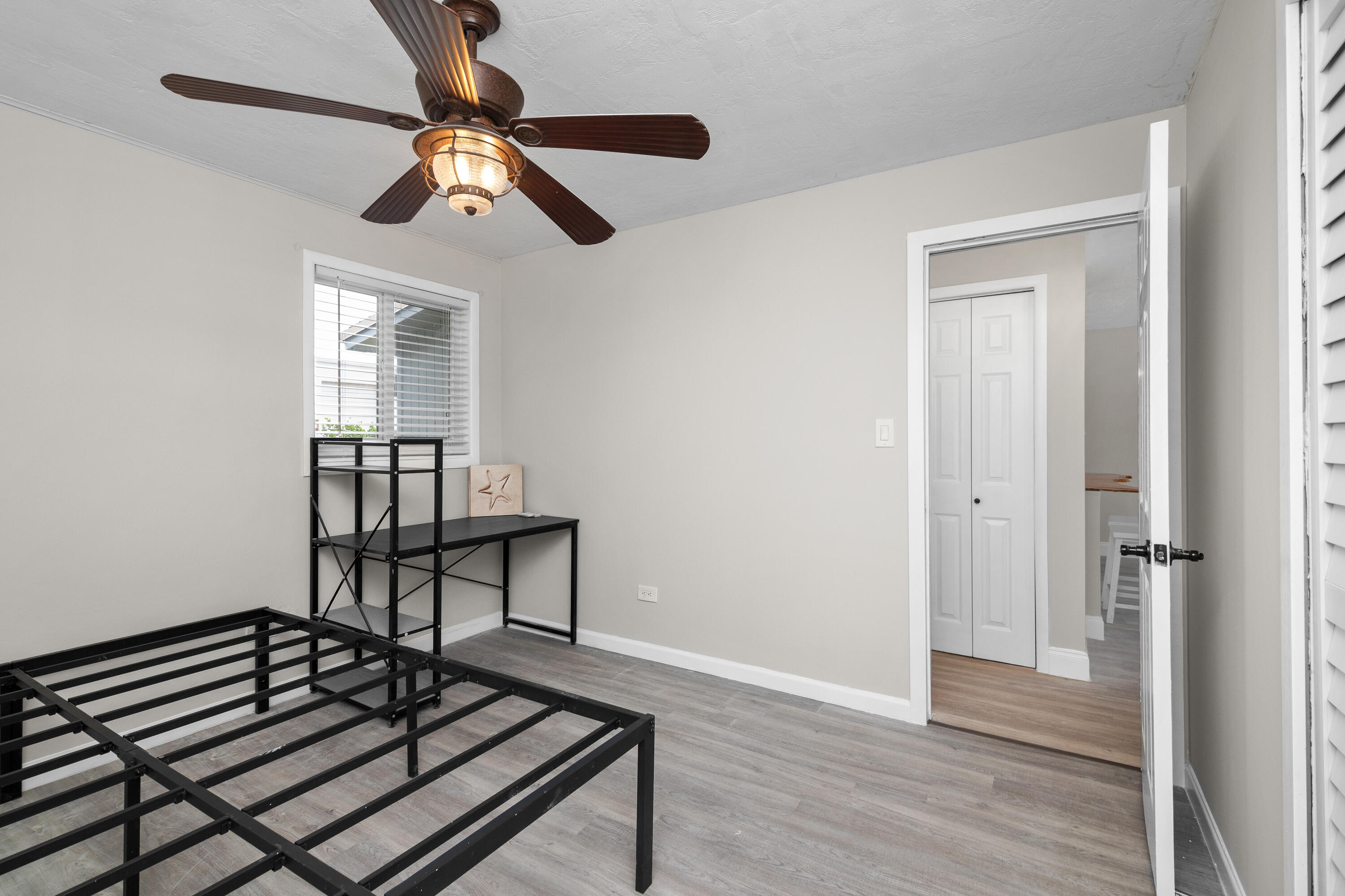 10873 7th Ave Gulf Marathon, FL 33050 - Photo 6 of 25 a view of a livingroom with wooden floor