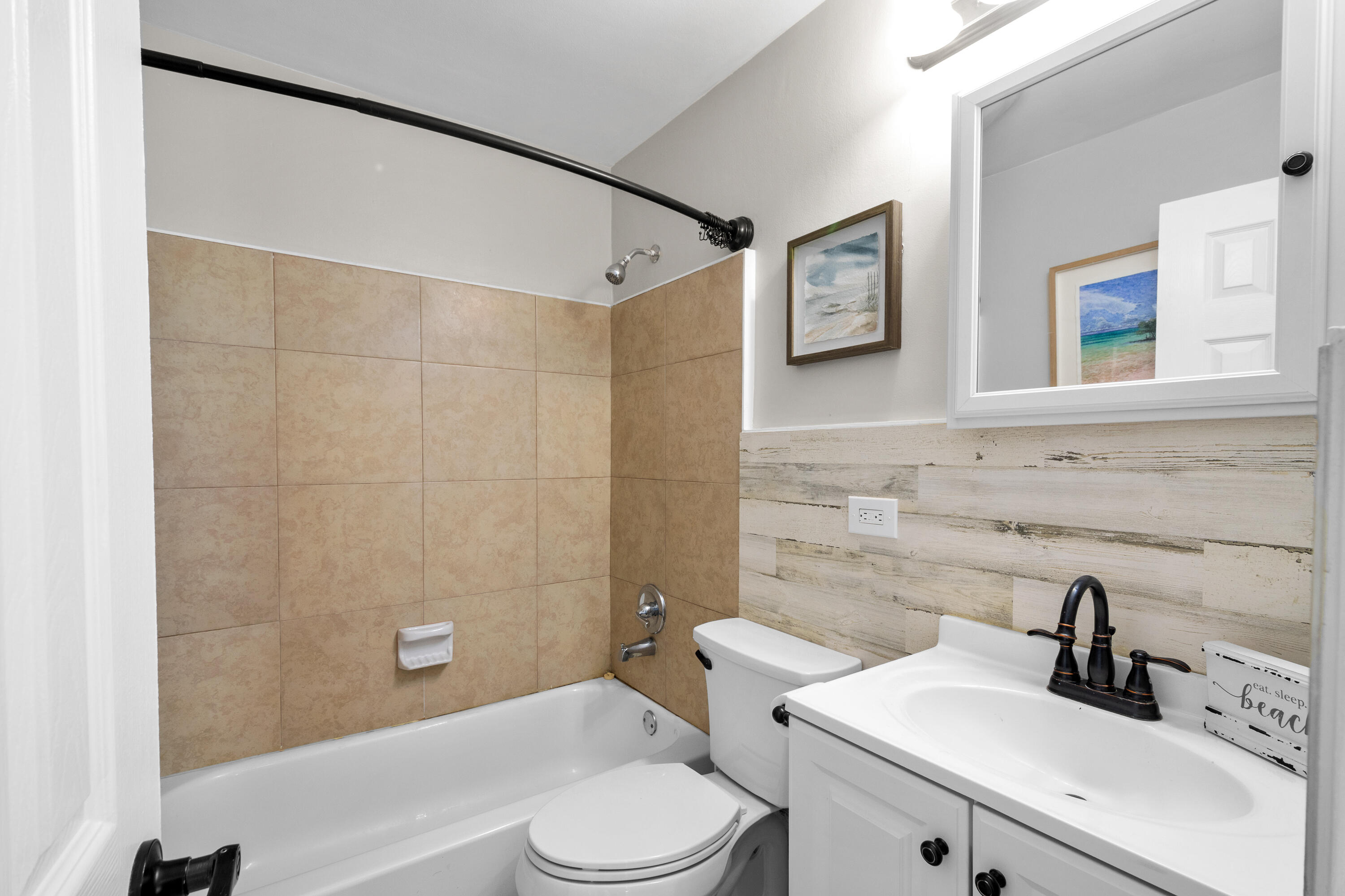 10873 7th Ave Gulf Marathon, FL 33050 - Photo 8 of 25 a bathroom with a sink a toilet and shower