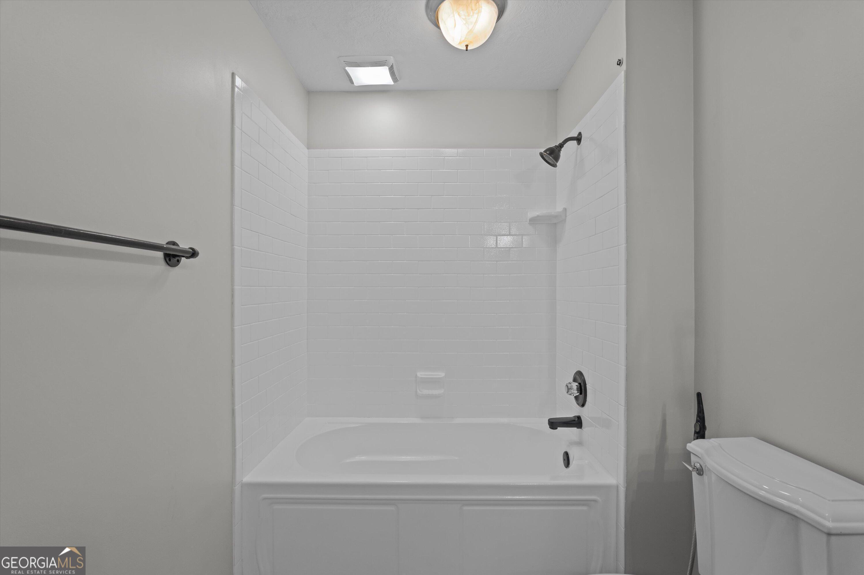 2507 Pinebluff Court Augusta, GA 30909 - Photo 11 of 56 a bathroom with a bathtub and a toilet