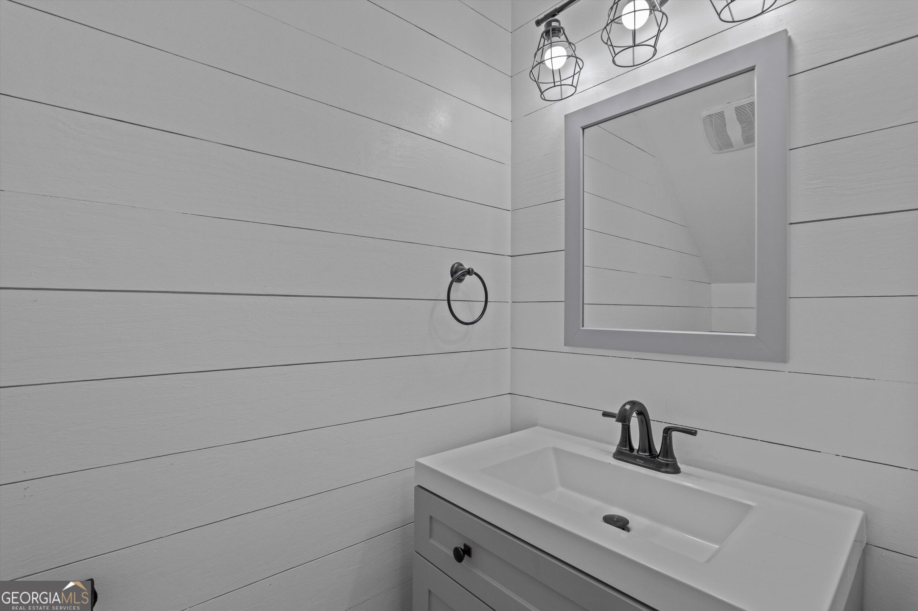 2507 Pinebluff Court Augusta, GA 30909 - Photo 13 of 56 a bathroom with a sink and vanity