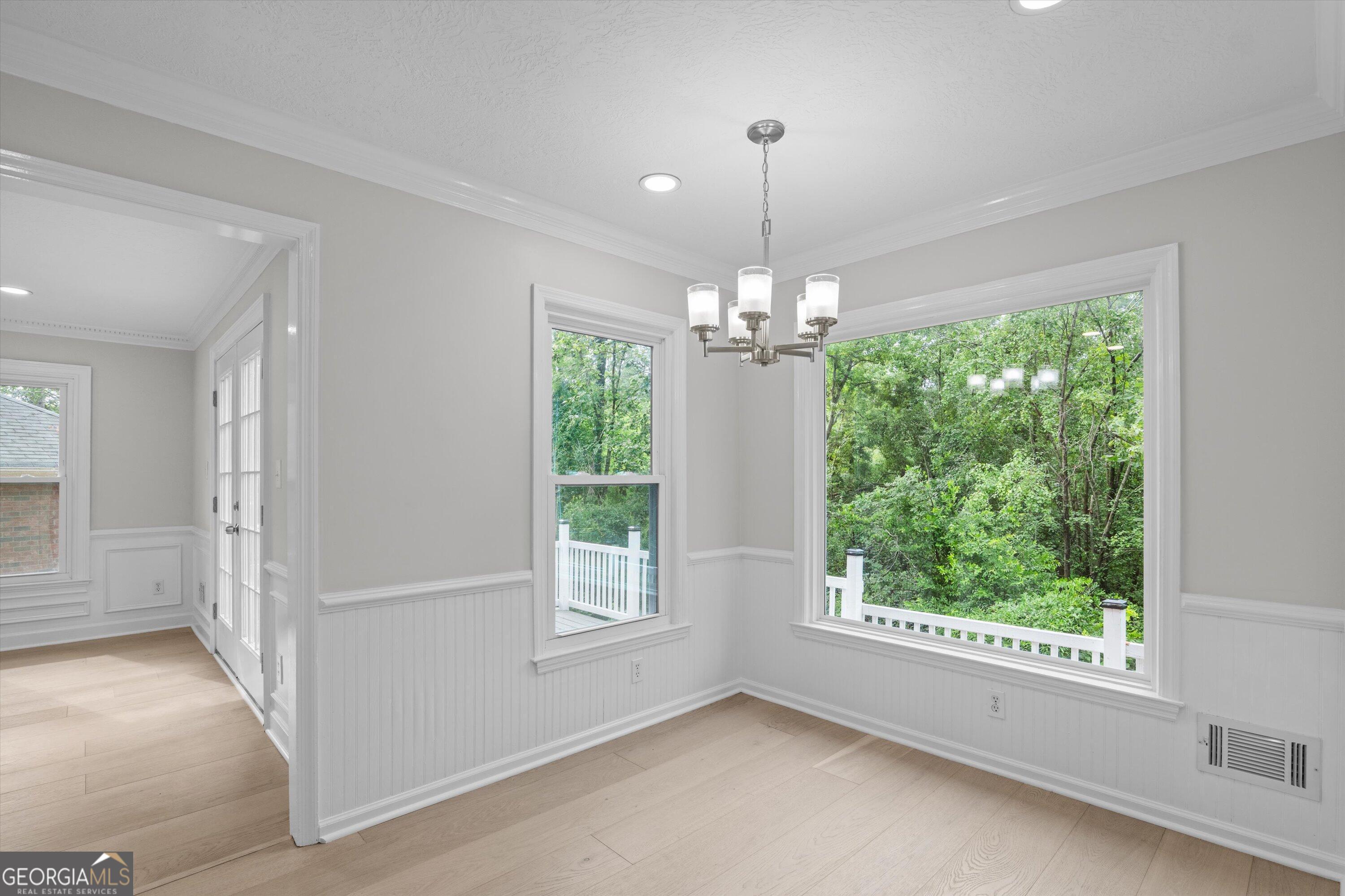 2507 Pinebluff Court Augusta, GA 30909 - Photo 23 of 56 a view of empty room with wooden floor and outdoor view