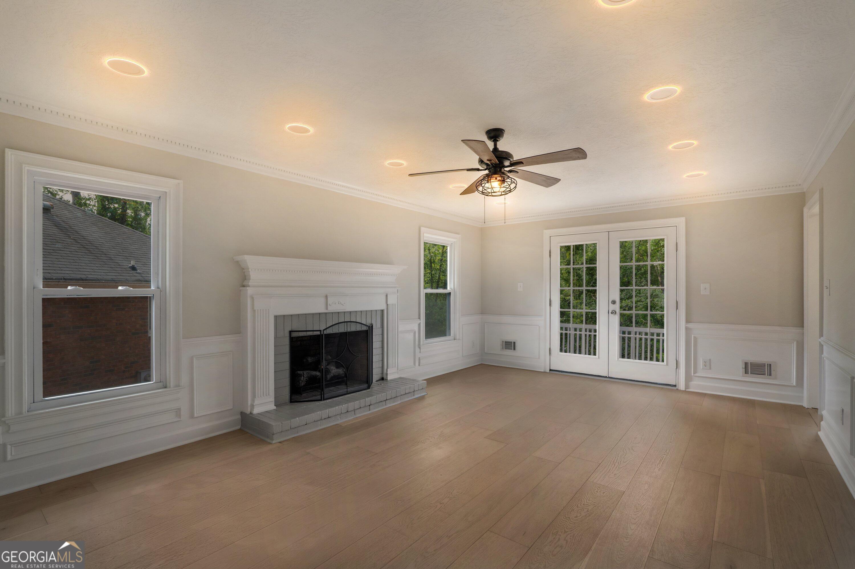 2507 Pinebluff Court Augusta, GA 30909 - Photo 30 of 56 a view of an empty room with a fireplace and a window