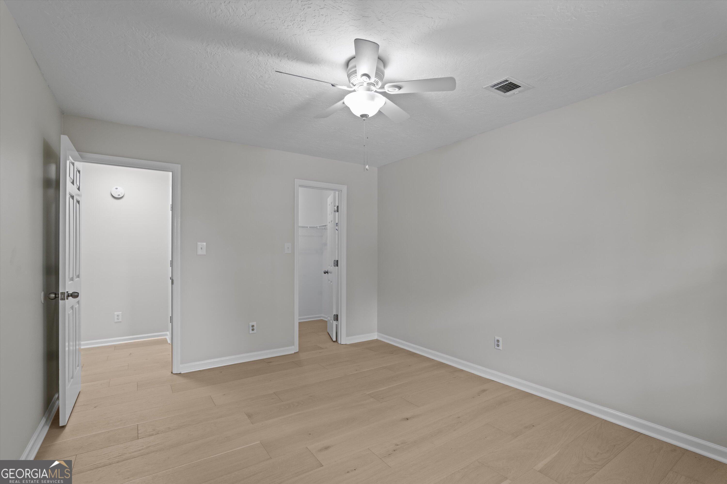 2507 Pinebluff Court Augusta, GA 30909 - Photo 39 of 56 a view of a room with a ceiling fan and a bathroom