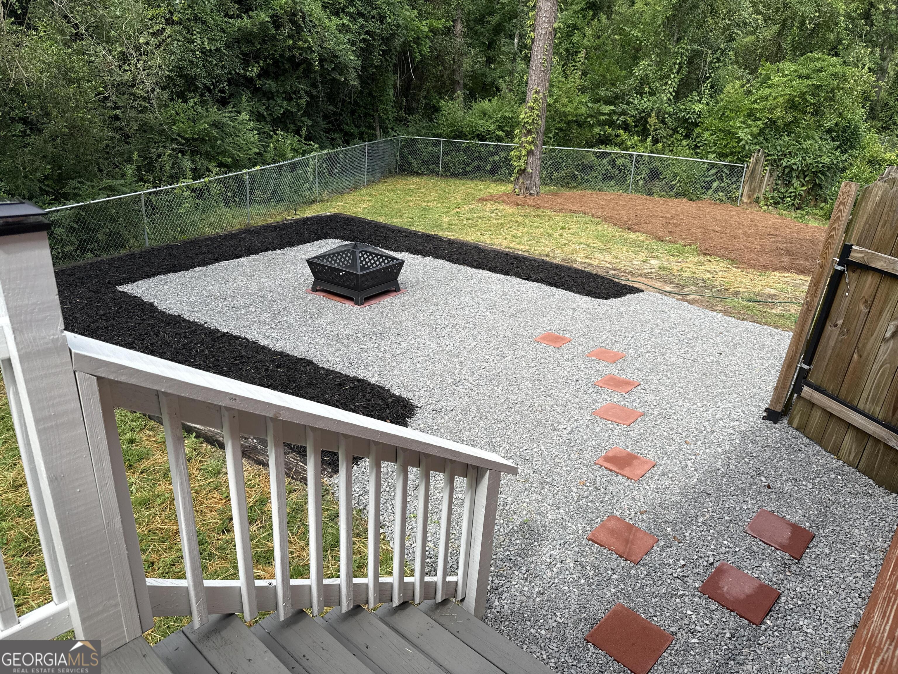 2507 Pinebluff Court Augusta, GA 30909 - Photo 51 of 56 a view of a chairs and table on the deck
