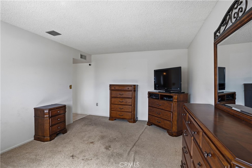 25990 Roanoke Road Menifee, CA 92586 - Photo 22 of 47 a view of a livingroom with furniture