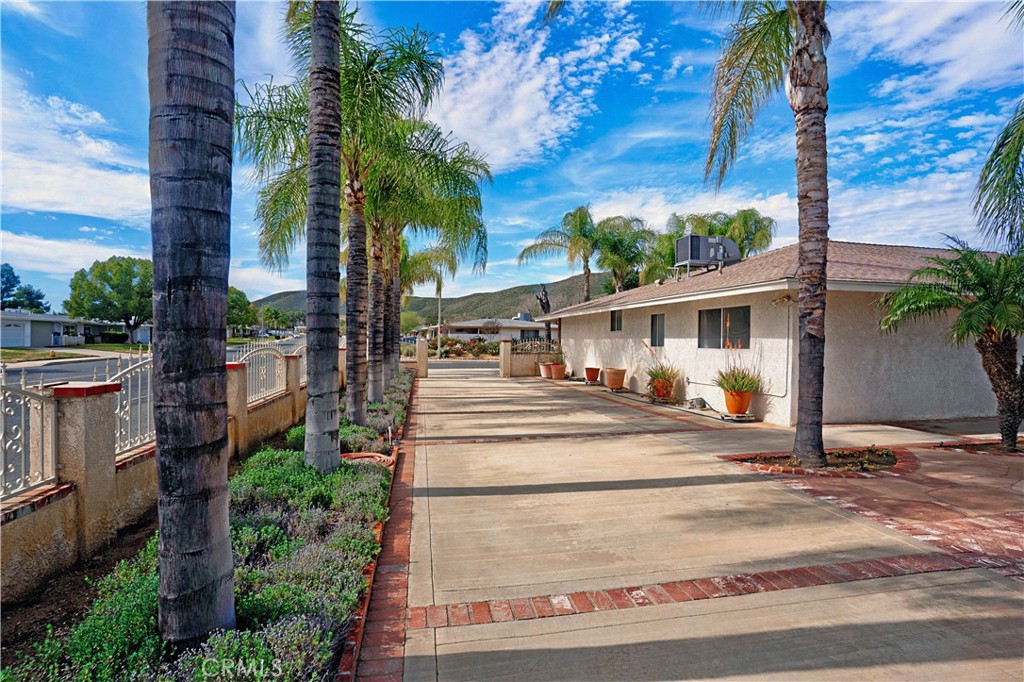 25990 Roanoke Road Menifee, CA 92586 - Photo 40 of 47 a view of street along with house and trees