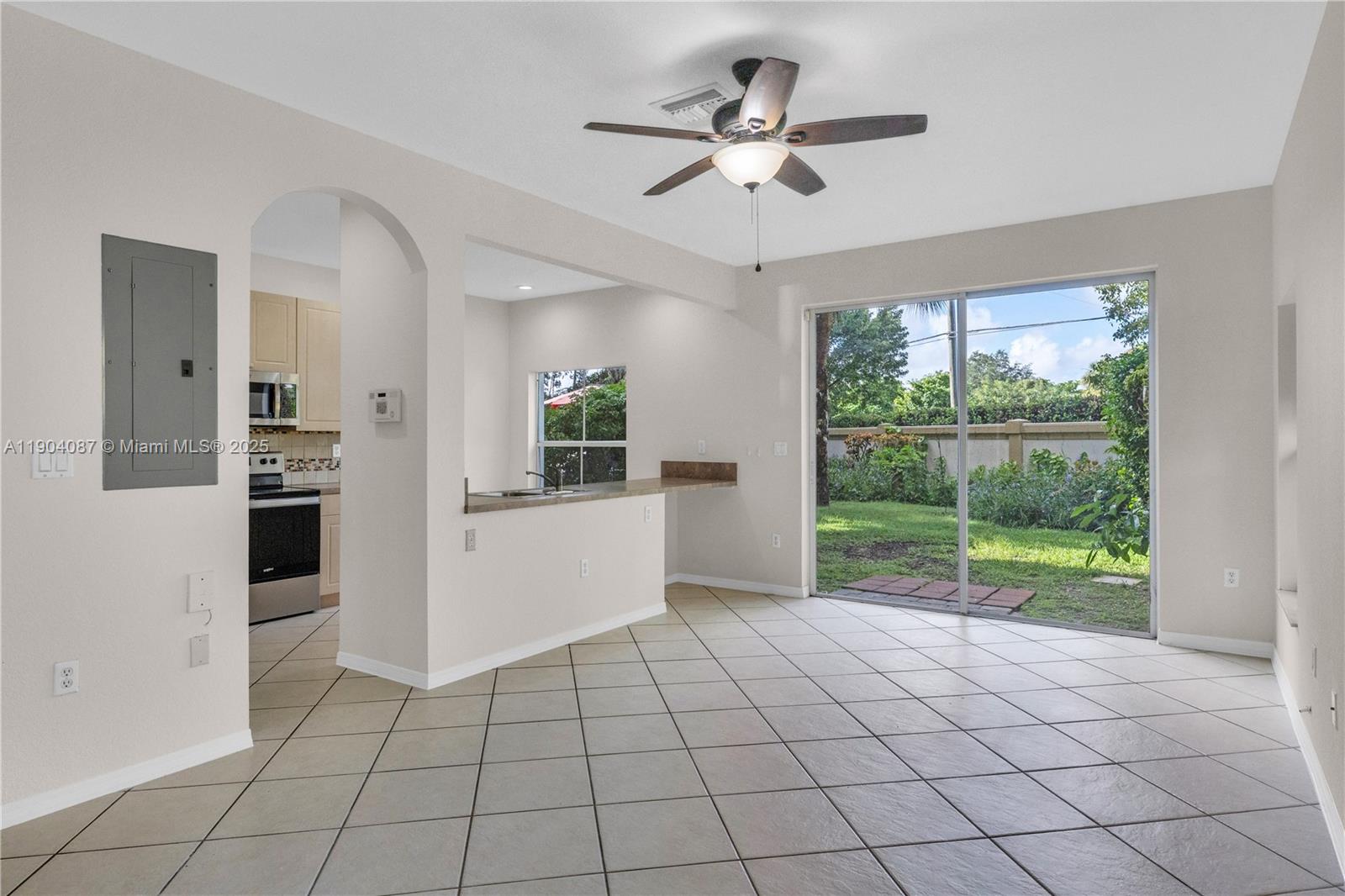 3459 Merrick Lane, Unit 501 Margate, FL 33063 - Photo 19 of 26 a view of an empty room with a window