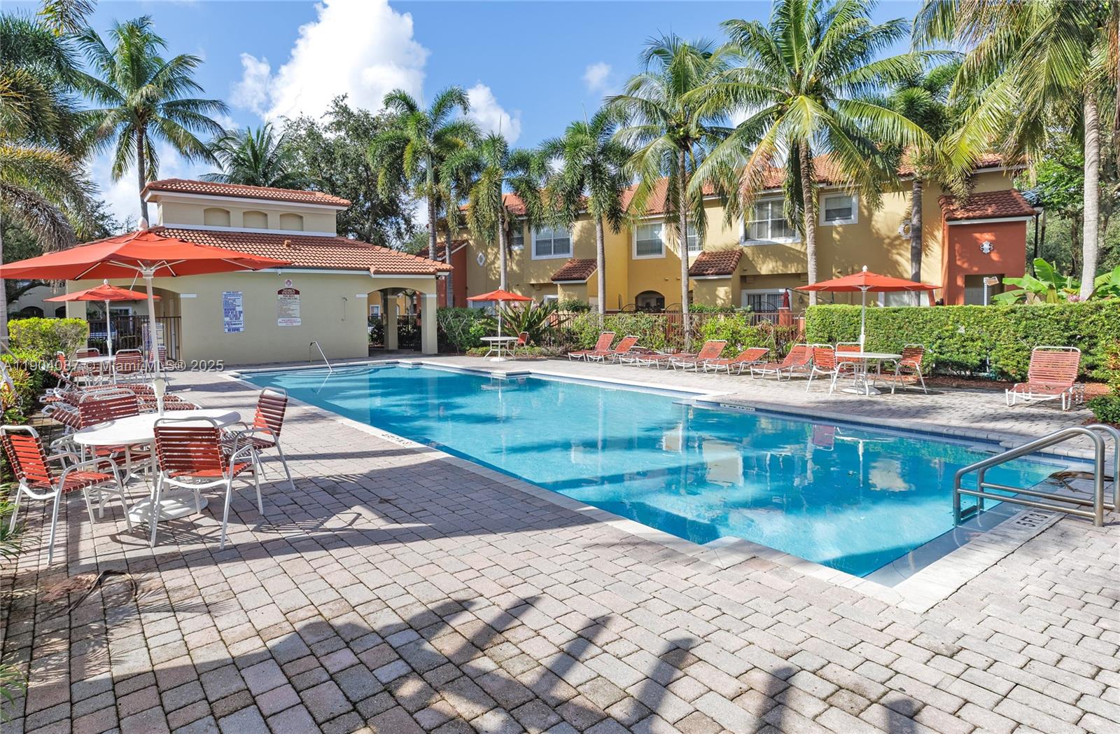 3459 Merrick Lane, Unit 501 Margate, FL 33063 - Photo 22 of 26 a front view of house with yard and outdoor seating
