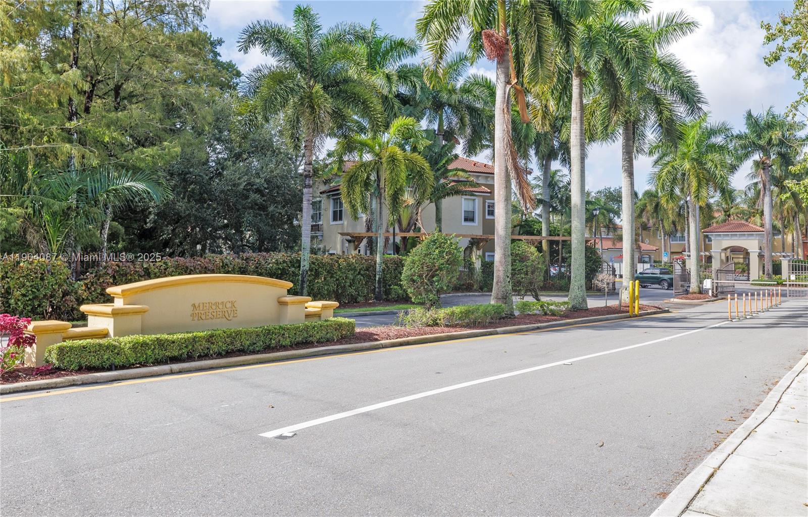 3459 Merrick Lane, Unit 501 Margate, FL 33063 - Photo 26 of 26 a view of swimming pool with a yard and palm trees