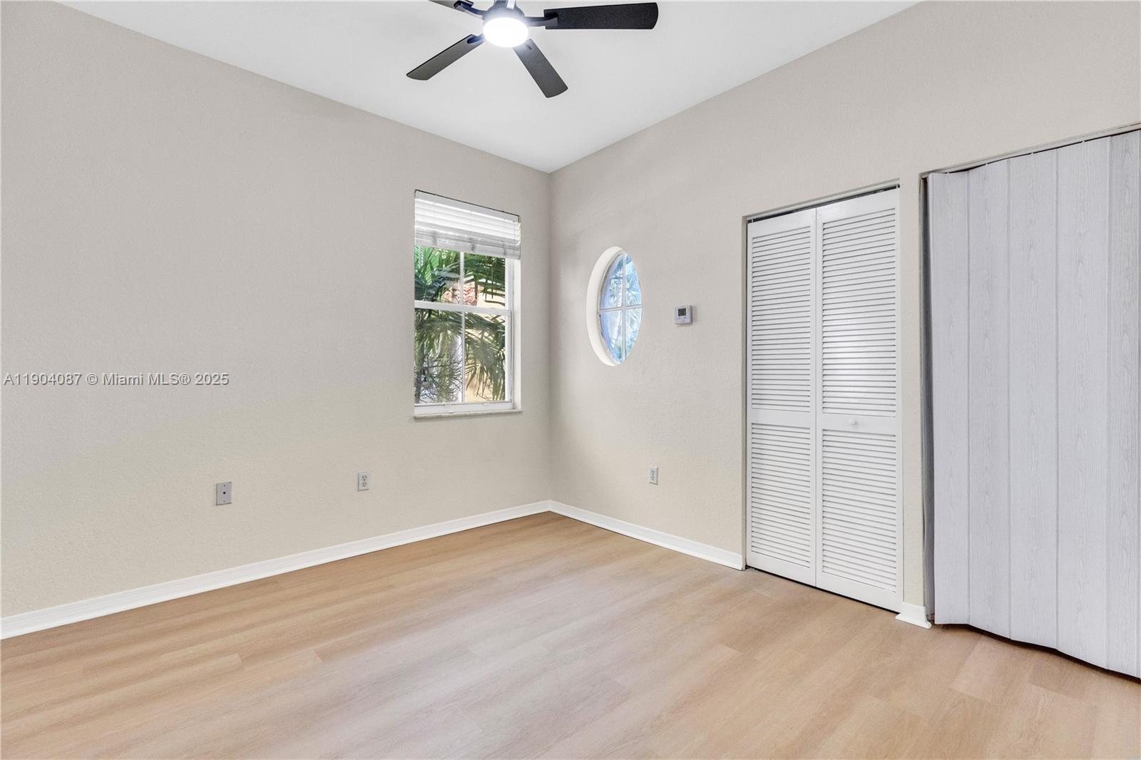 3459 Merrick Lane, Unit 501 Margate, FL 33063 - Photo 7 of 26 wooden floor in an empty room
